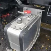 Metro FB-10 tow truck hydraulic oil tank and control components close-up