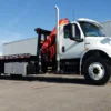 Metro FB-15 flatbed recovery truck with knuckle boom crane mounted behind cab