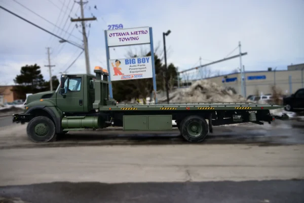 Metro FB-15 flatbed truck military green long-wheelbase configuration