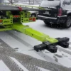 Metro FB-20 heavy-duty under-reach towing attachment extended behind truck in snow