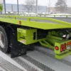 Metro FB-20 flatbed rear section with dual axles, hydraulic system, and safety lighting