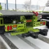 Metro FB-20 heavy-duty underlift and rear tow attachments in lime green finish