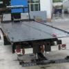 Metro Flatbed FB-5 rear deck view with wheel lift extended