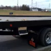 Metro Flatbed FB-5 carrier rear deck and wheel lift safety equipment close-up
