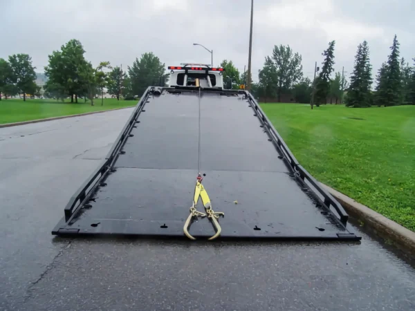 Metro Flatbed FB-5 hydraulic tilt deck fully lowered for vehicle loading