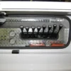 Metro Tow Trucks INT-16 heavy-duty wrecker control panel close-up with hydraulic lever system