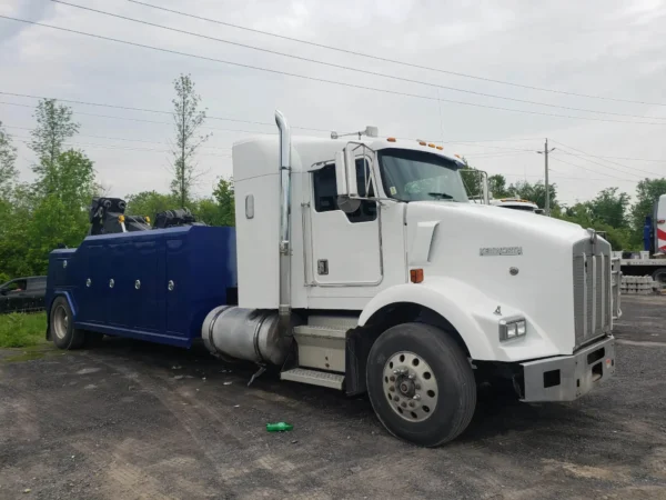 Metro Tow Trucks INT-16 white and blue heavy-duty integrated wrecker front angled view parked roadside