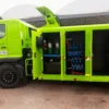 Metro Tow Trucks INT-16 green heavy-duty integrated wrecker tool storage compartments open, left side view