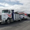 Metro Tow Trucks INT-16 white heavy-duty integrated wrecker on roadside