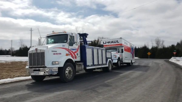 Metro Tow Trucks INT-16 white heavy-duty integrated wrecker on roadside