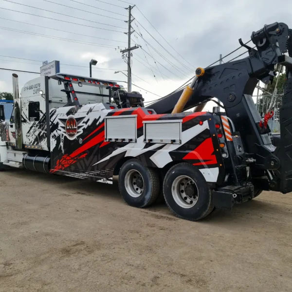 Black and silver INT-35 integrated wrecker showcasing aggressive recovery configuration and winch