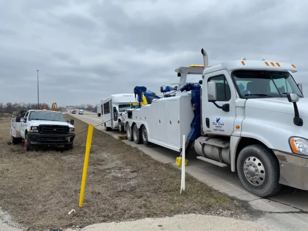 INT-60 heavy duty tow truck positioned roadside for commercial vehicle recovery support
