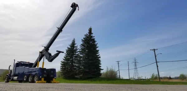 INT-60 integrated wrecker with telescopic boom raised on roadside