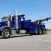 Blue INT-60 heavy duty integrated wrecker with boom extended
