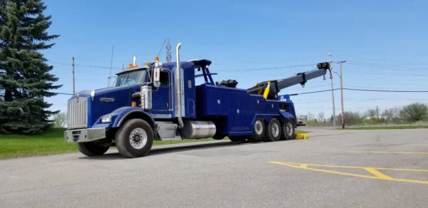 Blue INT-60 heavy duty integrated wrecker with boom extended