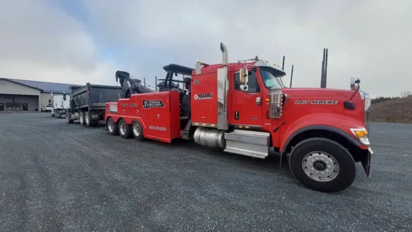 INT-60 integrated heavy wrecker in red equipped for major truck recovery and roadside assistance