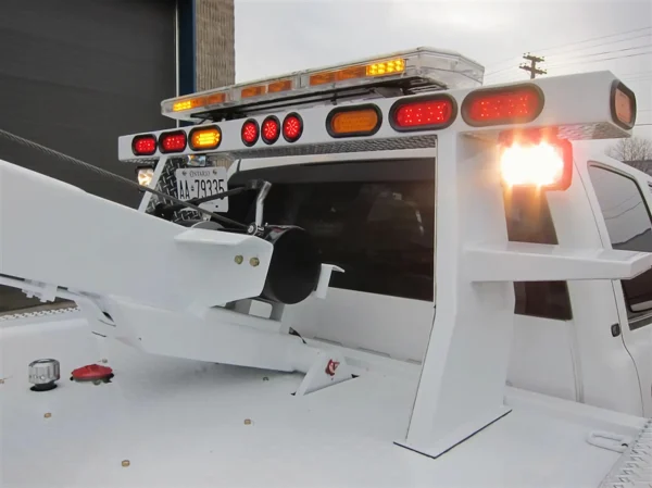 Metro Tow Trucks INT-5 white recovery boom and warning lights close-up