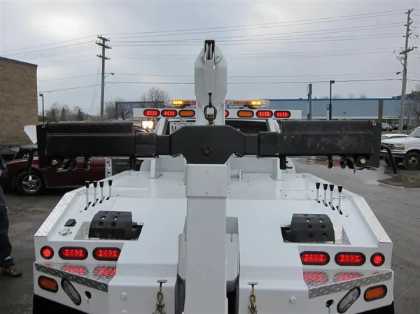 Metro Tow Trucks INT-5 white boom top view showing towing attachment points