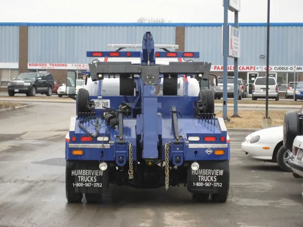 Blue INT-5 wrecker rear view with wheel-lift