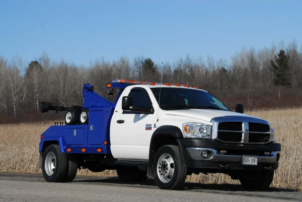 Metro Tow Trucks INT-5 blue integrated tow truck front side profile