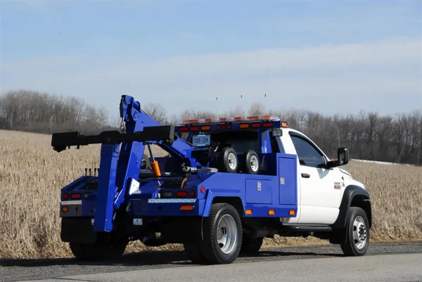 Metro Tow Trucks INT-5 blue integrated wrecker rear three-quarter right view