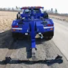 Metro Tow Trucks INT-5 blue rear view underlift extended in working position