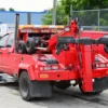 Metro Tow Trucks INT-5 red integrated tow truck rear view showing dolly and underlift system