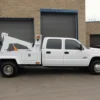 Metro Tow Trucks INT-5 white integrated wrecker rear angled view