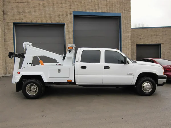Metro Tow Trucks INT-5 white integrated wrecker rear angled view