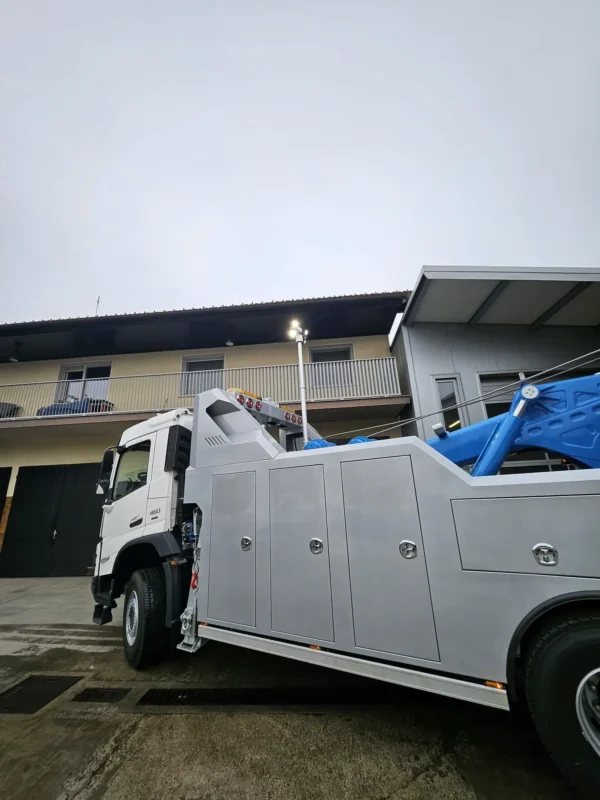 Metro Tow Trucks Integrated INT-30 wrecker rear-side view showing body compartments