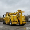 Metro RTR-16 rotator with extended boom performing industrial towing task