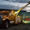Metro RTR-16 rotator wrecker illuminated for nighttime heavy recovery mission