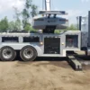 Metro Tow Trucks RTR-35 rotator heavy wrecker deploying stabilizers during roadside recovery