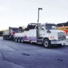 Metro Tow Trucks RTR-35 rotator towing loaded trailer in heavy-duty recovery service