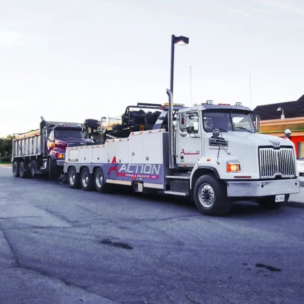 Metro Tow Trucks RTR-35 rotator towing loaded trailer in heavy-duty recovery service