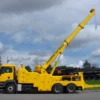 Metro Tow Trucks RTR-35 rotator wrecker lifting with extended boom in heavy-duty rescue operation
