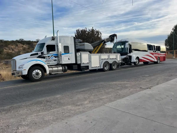 Metro Tow Trucks RTR-35 rotator towing a bus