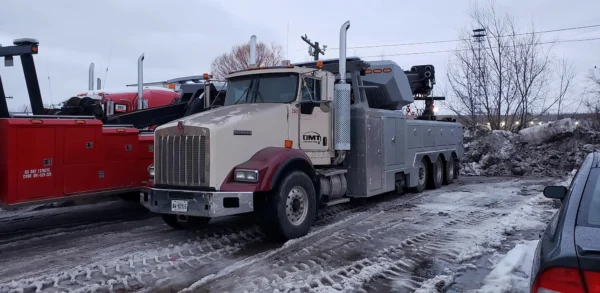 Metro Tow Trucks RTR-50 rotator in a snow-covered recovery yard