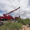 Metro Tow Trucks RTR-50 rotator using extended boom for heavy-duty off-road vehicle recovery