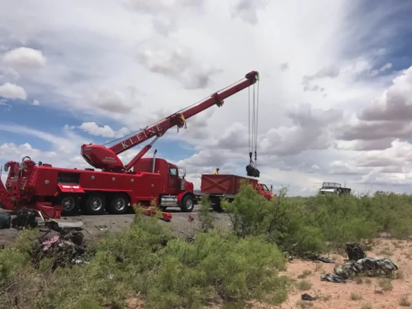 Metro Tow Trucks RTR-50 rotator using extended boom for heavy-duty off-road vehicle recovery