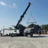 Metro Tow Trucks RTR-50 rotator using boom and rigging to lift a vehicle