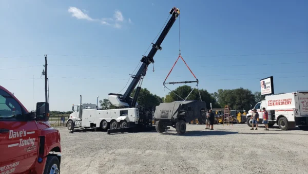Metro Tow Trucks RTR-50 rotator using boom and rigging to lift a vehicle
