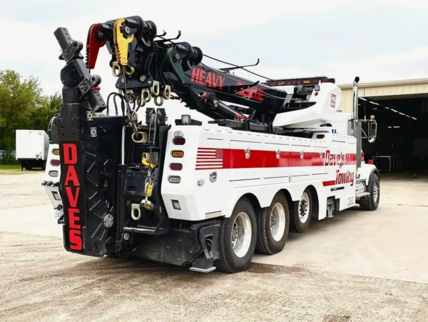 Metro Tow Trucks RTR-50 heavy rotator in white and red livery, rear view with boom and outriggers