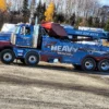 Metro Tow Trucks RTR-50 rotator in blue HEAVY RECOVERY livery, parked on job site