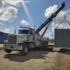 Metro RTR-70 rotator lifting freight container during industrial recovery