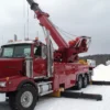 Metro RTR-70 70-ton rotator deployed in snowy roadside heavy recovery setup