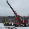 Metro RTR-70 heavy rotator lifting construction vehicle in winter recovery scene
