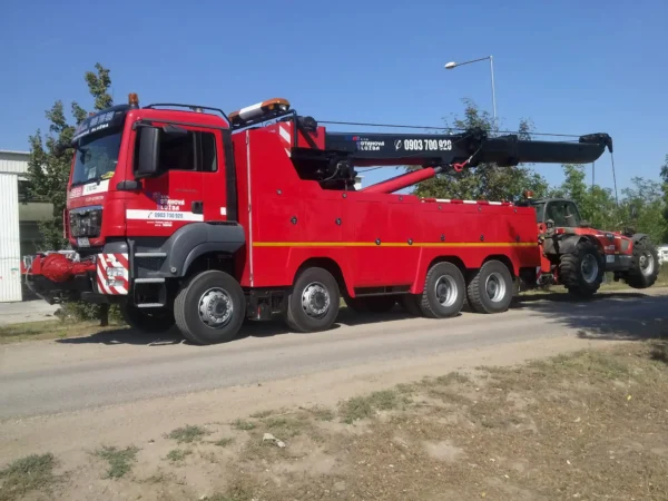Metro RTR-70 heavy-duty rotator tow truck with multi-axle support for large vehicle recovery