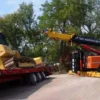 Metro RTR-70 heavy rotator performing trailer and loader recovery operation
