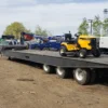 TSA-50 heavy-duty trailer loaded with small equipment, demonstrating deck capacity and stability